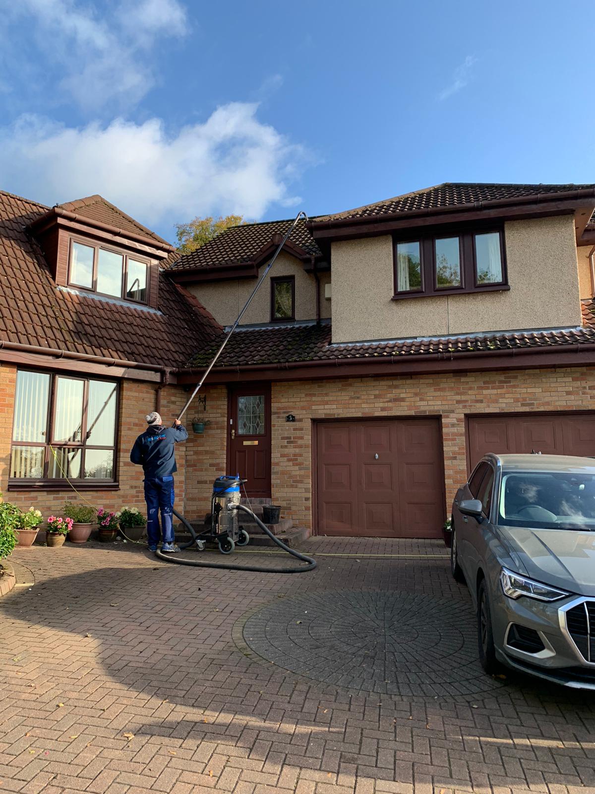 Exterior Cleaning Services Ltd sky vac in action cleaning gutters in Dunfermline