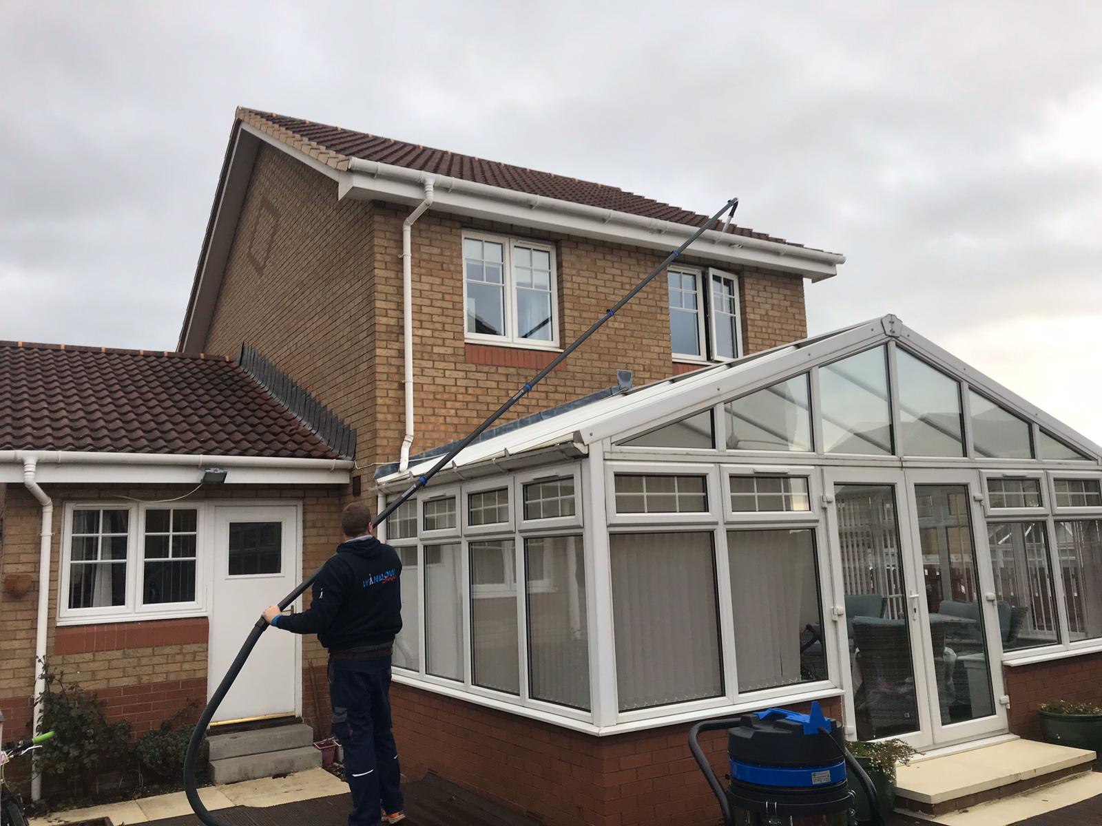 Exterior Cleaning Services Ltd sky vac in action cleaning gutters in Rosyth